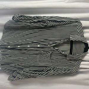 Blue and white stripped button down shirt.